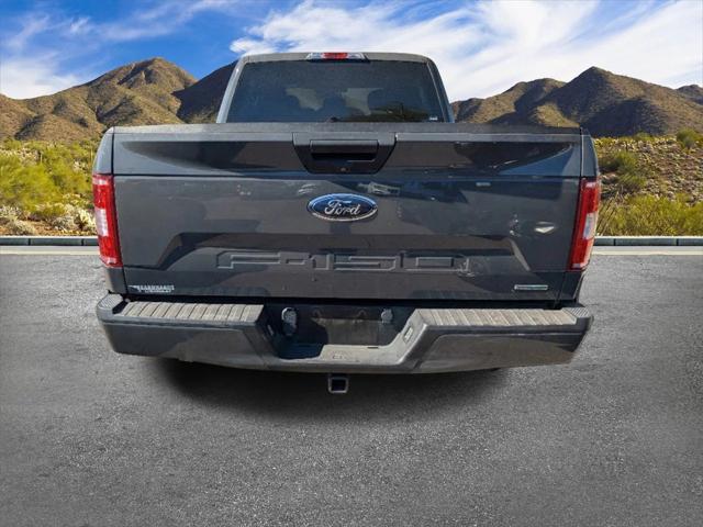 used 2018 Ford F-150 car, priced at $23,356