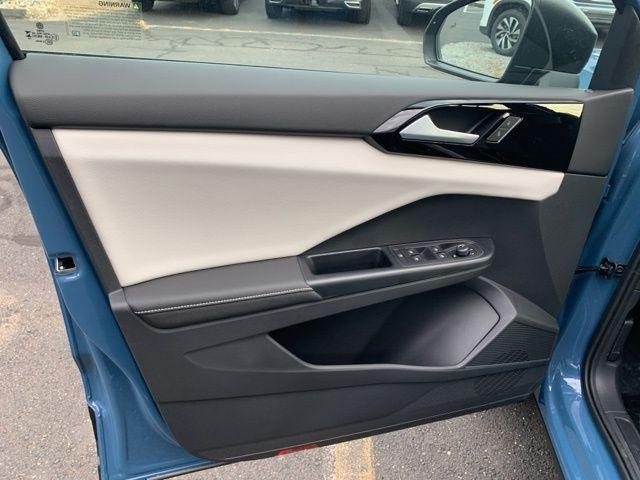 new 2025 Volkswagen Taos car, priced at $27,374