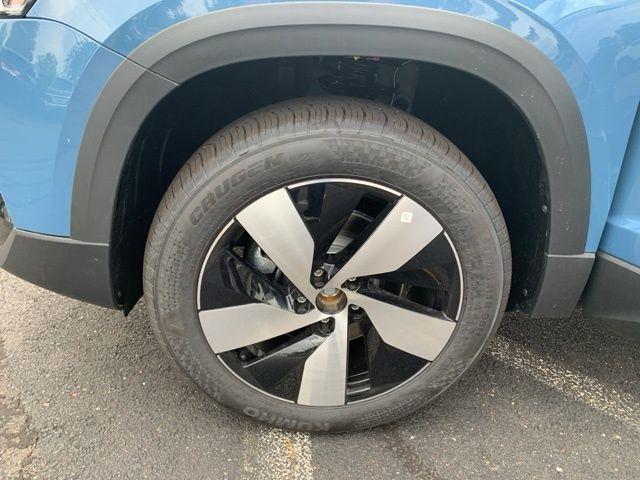 new 2025 Volkswagen Taos car, priced at $27,374