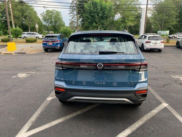 new 2025 Volkswagen Taos car, priced at $27,374