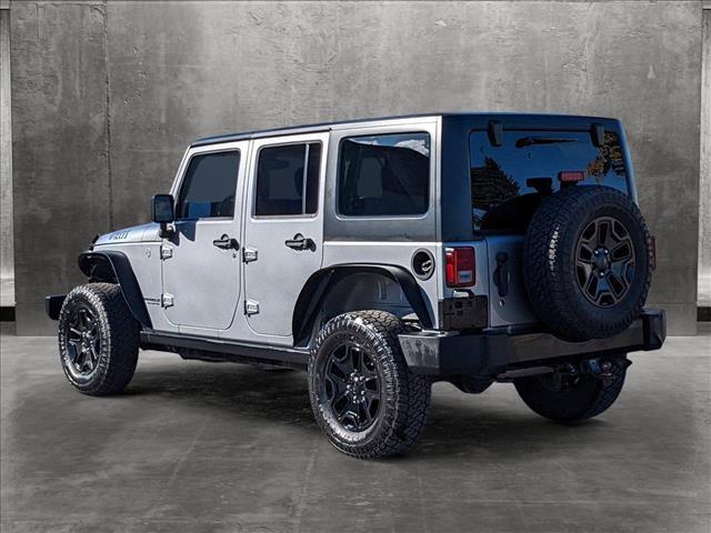 used 2016 Jeep Wrangler Unlimited car, priced at $21,952