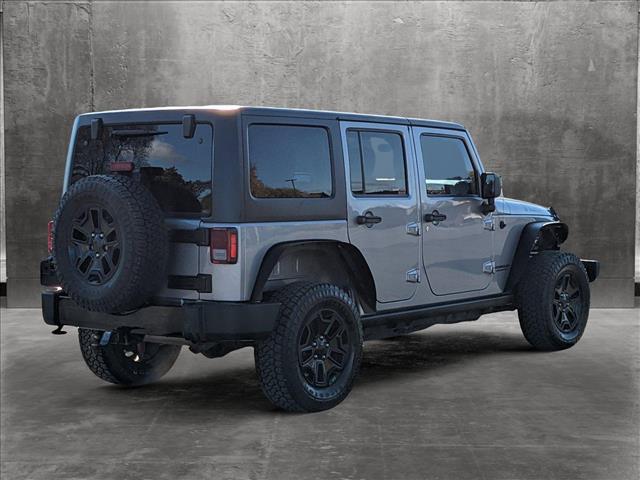 used 2016 Jeep Wrangler Unlimited car, priced at $21,952