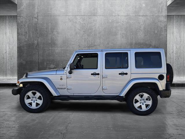 used 2012 Jeep Wrangler Unlimited car, priced at $11,892