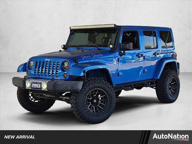 used 2015 Jeep Wrangler Unlimited car, priced at $17,476