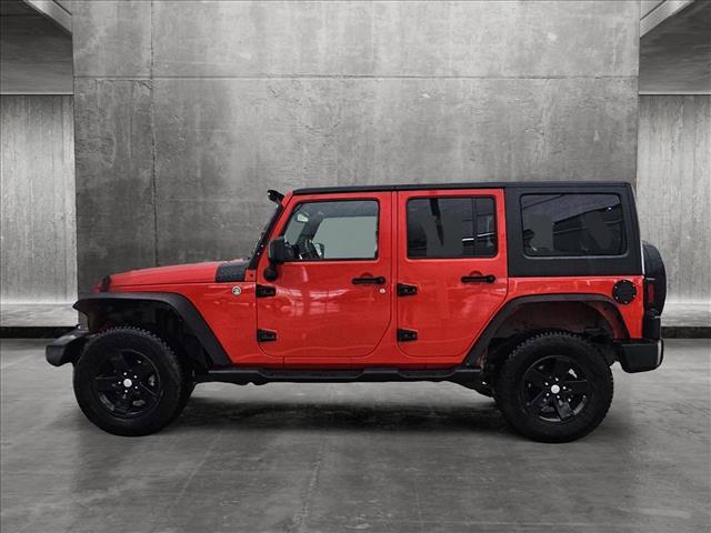 used 2015 Jeep Wrangler Unlimited car, priced at $20,991