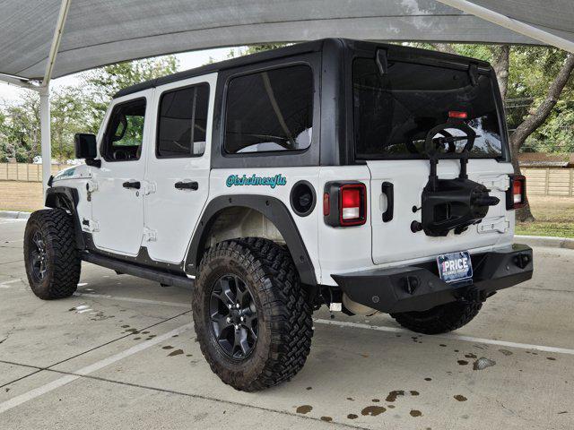 used 2021 Jeep Wrangler car, priced at $30,374