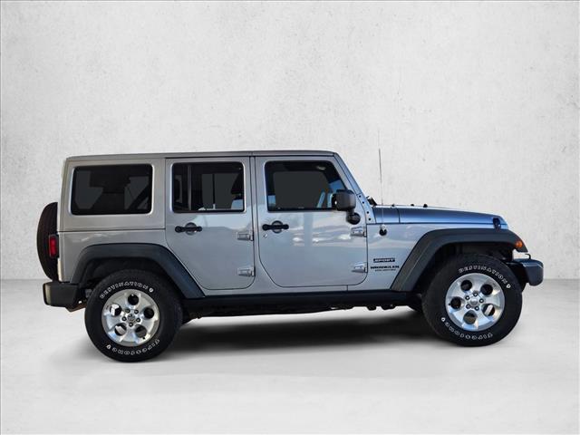 used 2013 Jeep Wrangler Unlimited car, priced at $15,992