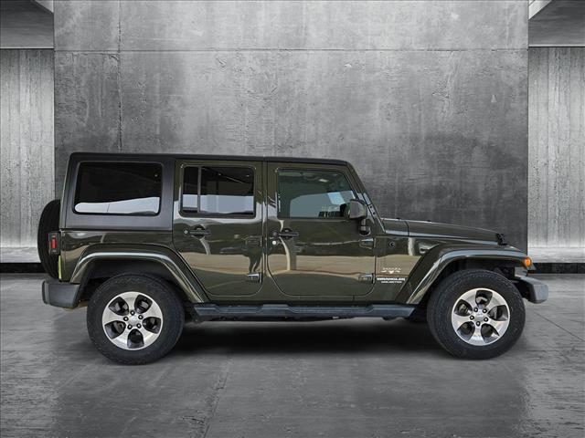 used 2016 Jeep Wrangler Unlimited car, priced at $21,559
