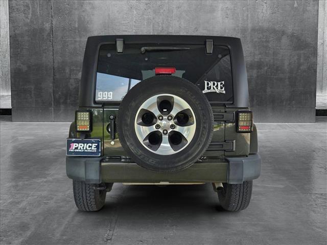 used 2016 Jeep Wrangler Unlimited car, priced at $21,559