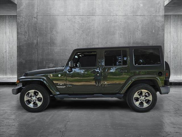 used 2016 Jeep Wrangler Unlimited car, priced at $21,559