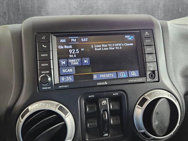 used 2016 Jeep Wrangler Unlimited car, priced at $21,559