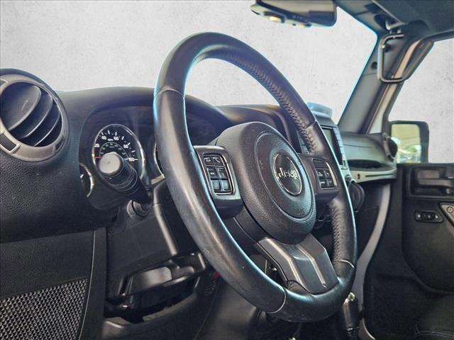 used 2017 Jeep Wrangler Unlimited car, priced at $19,482