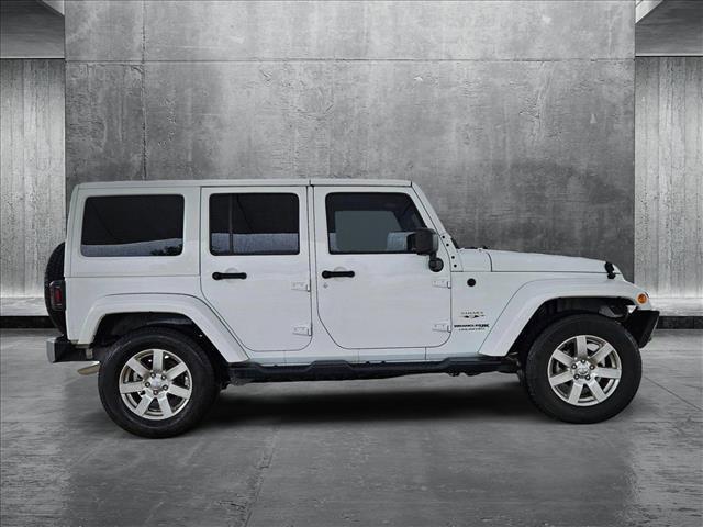 used 2018 Jeep Wrangler JK Unlimited car, priced at $24,986