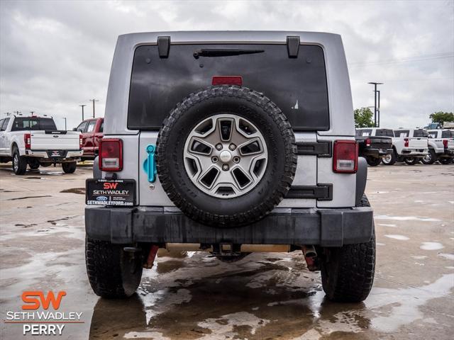 used 2014 Jeep Wrangler Unlimited car, priced at $24,588