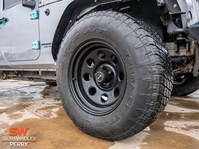 used 2014 Jeep Wrangler Unlimited car, priced at $24,588