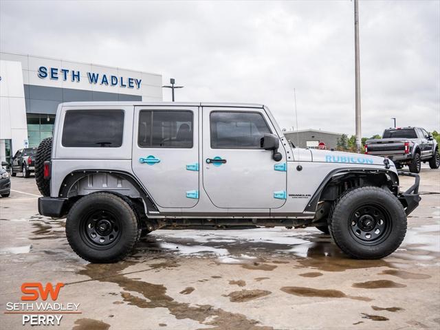 used 2014 Jeep Wrangler Unlimited car, priced at $24,588