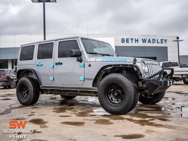 used 2014 Jeep Wrangler Unlimited car, priced at $24,588