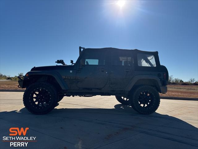 used 2014 Jeep Wrangler Unlimited car, priced at $21,800