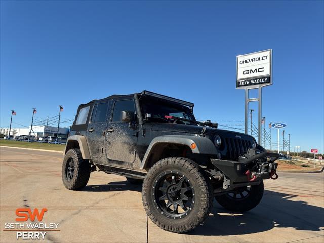 used 2014 Jeep Wrangler Unlimited car, priced at $21,800