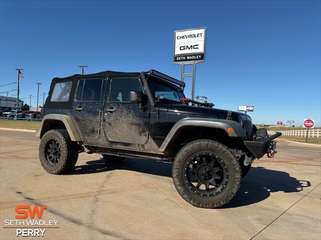 used 2014 Jeep Wrangler Unlimited car, priced at $21,800