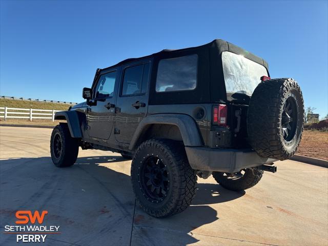 used 2014 Jeep Wrangler Unlimited car, priced at $21,800