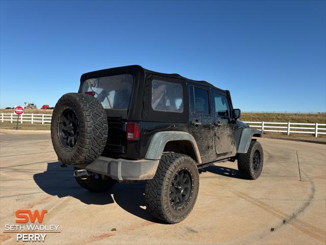 used 2014 Jeep Wrangler Unlimited car, priced at $21,800