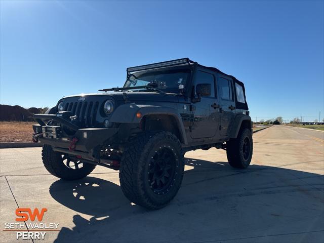 used 2014 Jeep Wrangler Unlimited car, priced at $21,800