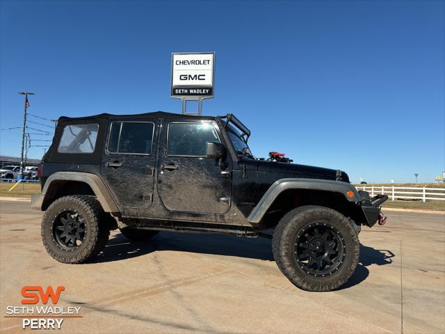 used 2014 Jeep Wrangler Unlimited car, priced at $21,800