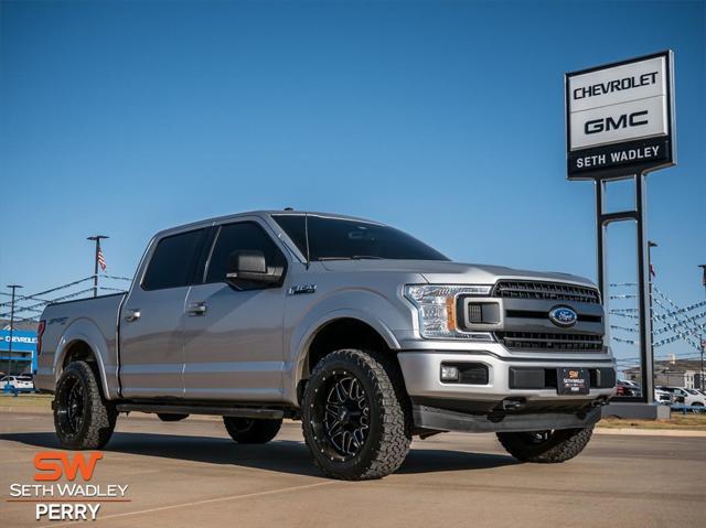 used 2018 Ford F-150 car, priced at $23,388