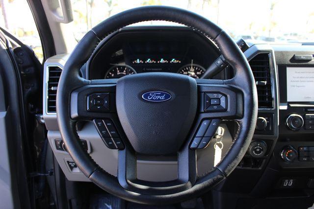 used 2019 Ford F-150 car, priced at $27,390