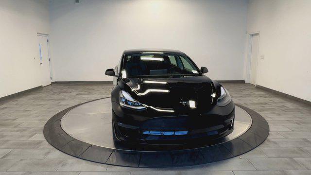 used 2022 Tesla Model 3 car, priced at $28,928
