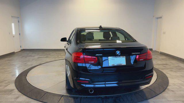 used 2018 BMW 320 car, priced at $17,565
