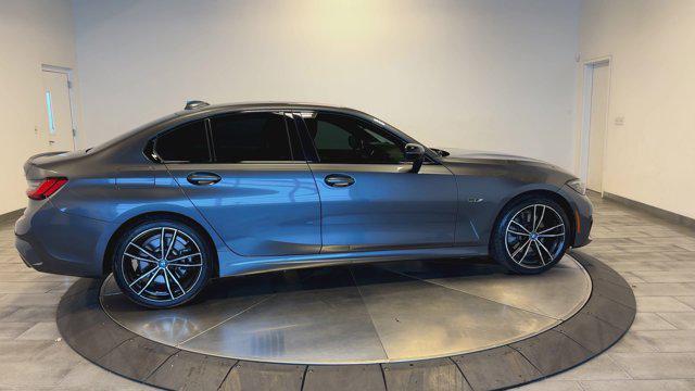 used 2022 BMW 330e car, priced at $29,203