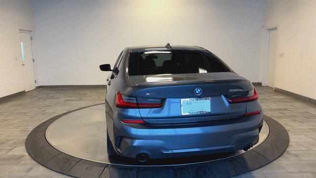 used 2022 BMW 330e car, priced at $29,203