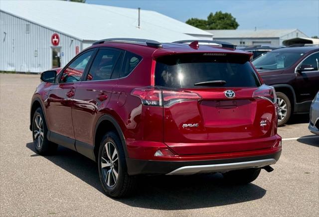 used 2018 Toyota RAV4 car, priced at $19,995