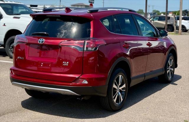 used 2018 Toyota RAV4 car, priced at $19,995