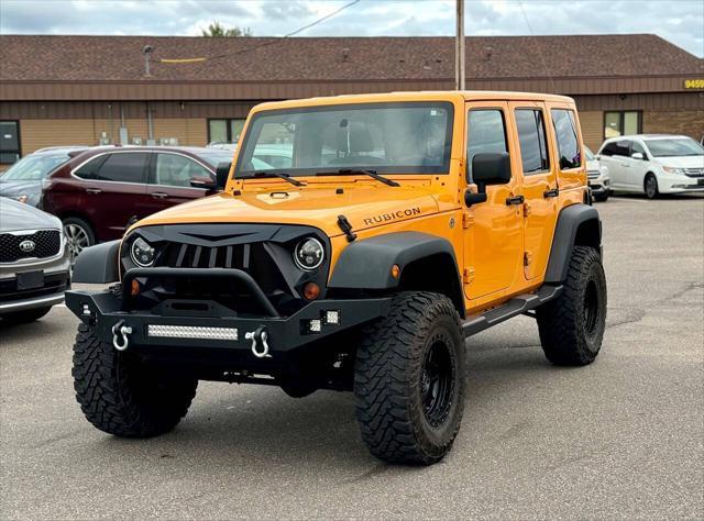 used 2012 Jeep Wrangler Unlimited car, priced at $13,995