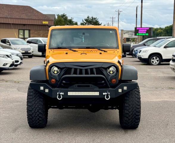 used 2012 Jeep Wrangler Unlimited car, priced at $13,995