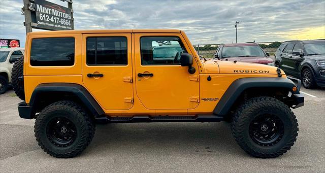 used 2012 Jeep Wrangler Unlimited car, priced at $13,995