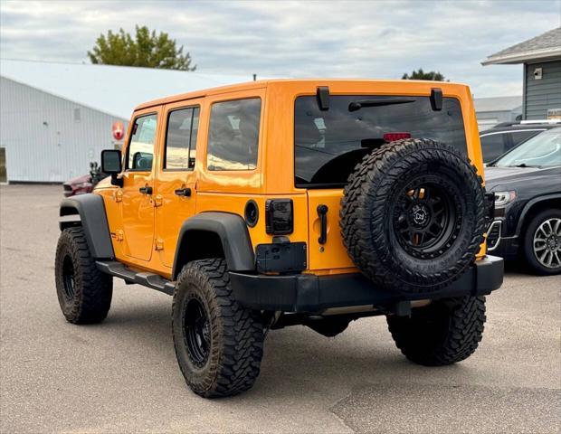 used 2012 Jeep Wrangler Unlimited car, priced at $13,995