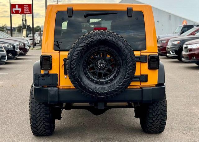 used 2012 Jeep Wrangler Unlimited car, priced at $13,995