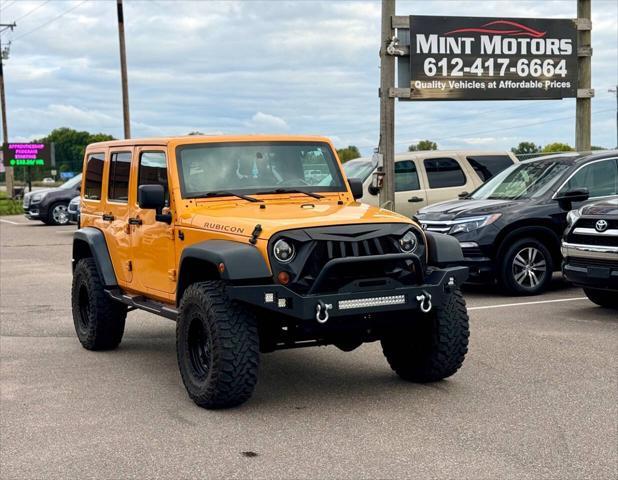 used 2012 Jeep Wrangler Unlimited car, priced at $13,995