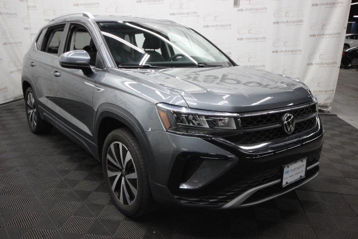 used 2023 Volkswagen Taos car, priced at $21,995