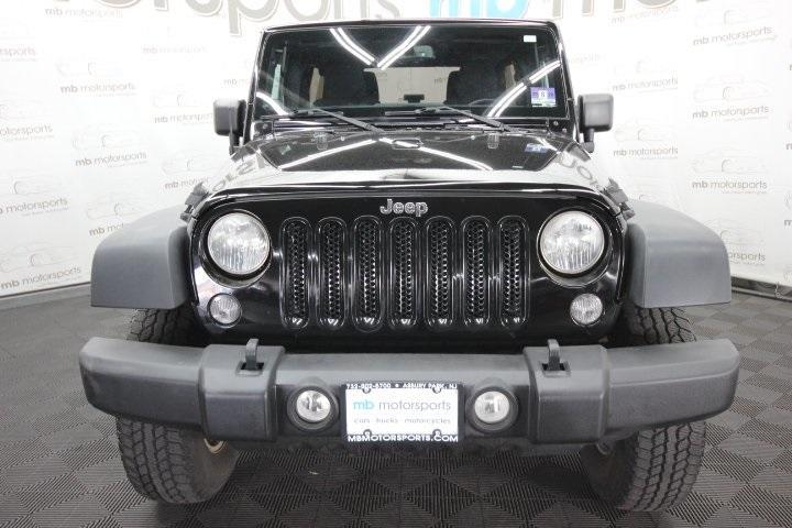 used 2014 Jeep Wrangler Unlimited car, priced at $14,995