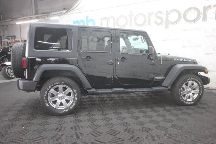 used 2014 Jeep Wrangler Unlimited car, priced at $20,995