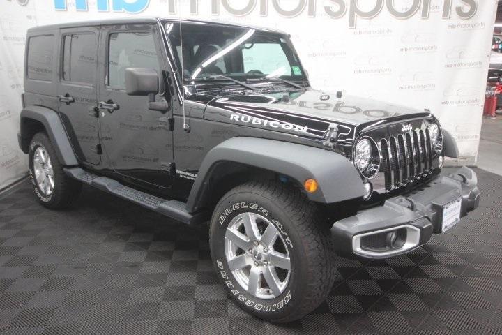 used 2014 Jeep Wrangler Unlimited car, priced at $20,995