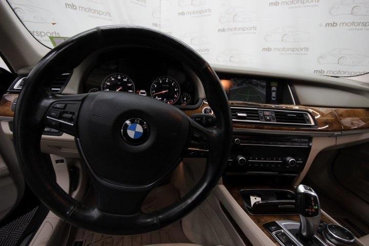 used 2014 BMW 740 car, priced at $11,995