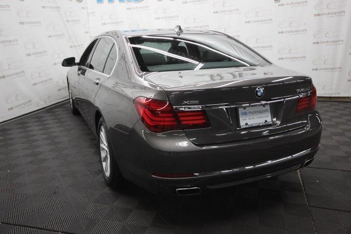 used 2014 BMW 740 car, priced at $11,995