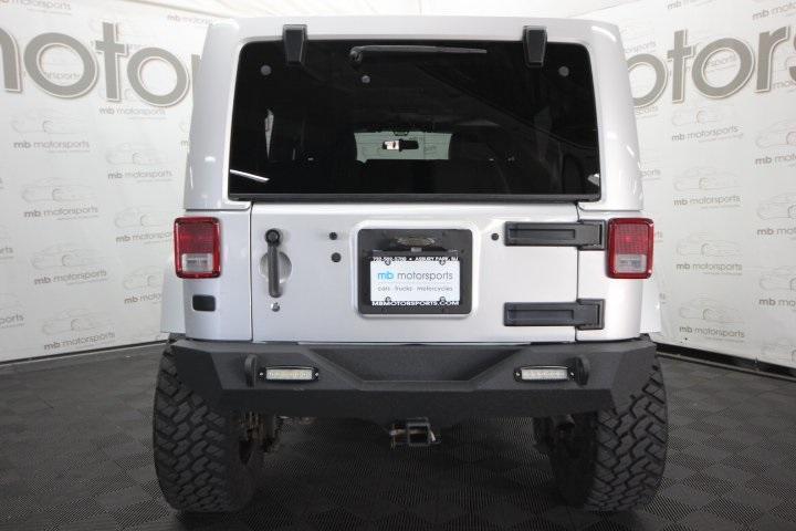 used 2012 Jeep Wrangler Unlimited car, priced at $19,995