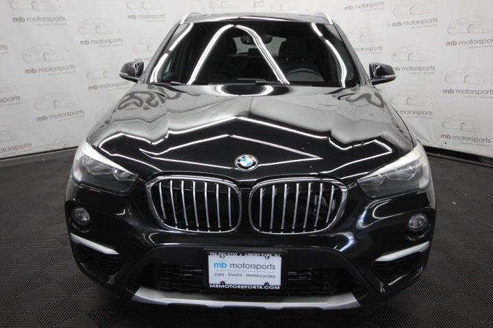 used 2018 BMW X1 car, priced at $13,995